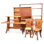 A late 20thC bespoke Parana pine dining room suite, in the Arts and Crafts style, comprising