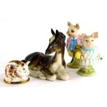 A Beswick ceramic model of Pigling Bland and Little Pig Robinson, brown back stamp, a Royal Crown