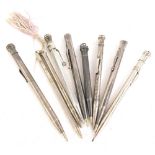 A quantity of silver and silver coloured metal propelling pencils, various makes.