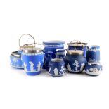 A collection of Wedgwood and other blue Jasperware, to include biscuit barrels, jardiniere, salad