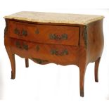 A French mahogany commode, with a serpentine shaped top with a variegated yellow marble, above two
