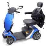 A Vecta mobility scooter, in blue with charger, back pack etc.