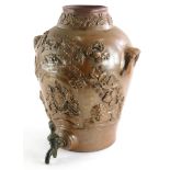 A 19thC stoneware urn, decorated with the Royal Crest and with side handles and brass tap, old