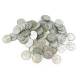 A quantity of mainly silver shillings, George V and George VI, etc.