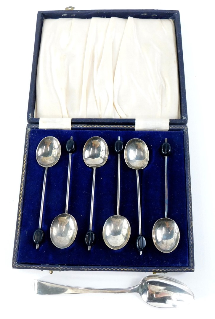 A set of six silver bean handled coffee spoons, and a 19thC silver teaspoon (7).