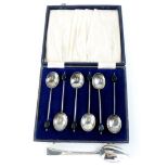 A set of six silver bean handled coffee spoons, and a 19thC silver teaspoon (7).