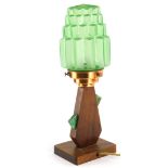 An Art Deco lamp base, the green moulded shade of tapering form with a copper fitting, the