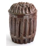 An unusual stoneware tobacco jar and cover, modelled in the form of cigars, 13cm high.