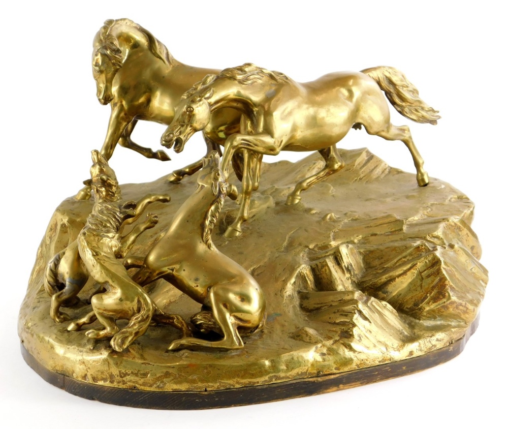 A late 19th/early 20thC bronze figure group, of wolves attacking a young foal and horses on a
