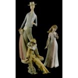 Three Spanish porcelain figures, to include a Nao Pierrot, a young girl holding a posy of flowers