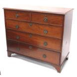 A late 19thC mahogany chest of drawers, the top with a moulded edge, above two short and three