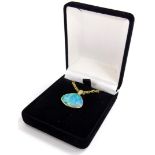 An opal and diamond pendant and chain, the opal doublet in a yellow metal surround stamped 585 14ct
