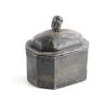 An early 19thC lead tobacco jar, the lid modelled in the form of a gentleman's head, traces of