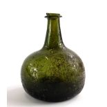 A 19thC green onion shaped glass bottle, 14cm high. (AF)