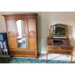 A late Victorian mahogany wardrobe, and dressing chest, with marquetry and satinwood cross