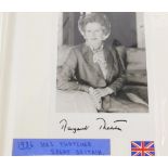 An album containing political photographs, to include some bearing the signatures of Margaret