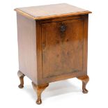 A walnut coal purdonium, the crossbanded top with a moulded edge above a fall front drawer,