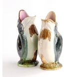 Two similar Victorian Majolica fish shaped jugs, 25cm high.