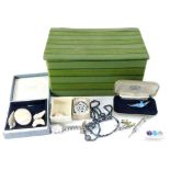 A quantity of costume jewellery, to include mother of pearl brooches, a nurses watch brooch, an