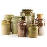 A collection of stoneware jars, to include a large example with mottled glaze, mainly unmarked, 25cm