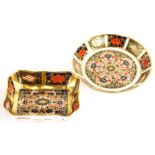 Two Royal Crown Derby porcelain pin trays, each decorated with the 1128 Imari pattern.