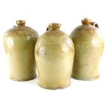 Three large stoneware flagons, stamped Metcalf, Lincoln, Cartledge Lincoln and Winter of Lincoln