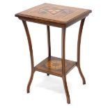An Edwardian walnut and parquetry two tier table, on splayed supports, 49cm wide.