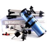 A Sky Watcher Reflector telescope, number SKP1145EQ1, in pale purple with tripod, original box,