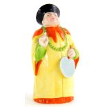 A Royal Worcester porcelain candle snuffer, modelled in the form of a Mandarin gentleman, 9cm high.
