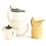 A Cobridge Victorian relief moulded jug, decorated with the Queens Crest, other devices etc., for