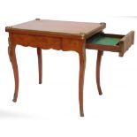 A French mahogany and boxwood strung card table, with gilt metal mounts, the rectangular top with