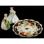 Two Royal Doulton figures of Penny and The Bridesmaid, and a Shelley Imari patterned plate decorated