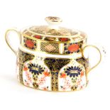 A Royal Crown Derby porcelain two handled sugar bowl and cover, decorated with the 1128 Imari
