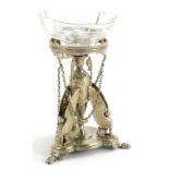 An Elkington and Co silver plated stand, in French Empire style, with a central three handled