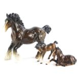 A Beswick ceramic figure of a horse, and two Beswick Foals, (3).