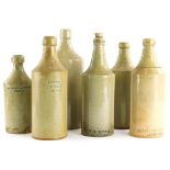 A collection of Lincoln stoneware bottles, to include W.Cottingham Chemist, another stamped W.H.