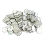 A quantity of mainly silver sixpences and shillings.