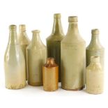 A collection of stamped porter and other stoneware flagons, to include Soulby, Alford, Hoyland,