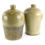 Two stoneware flagons, stamped Cape of Caldbeck and Kemp, Market Rasen, the largest 31cm high. (AF)
