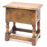 A small oak chest, the rectangular top with a moulded edge, enclosing a vacant interior, the front