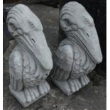 A pair of garden ornaments, each modelled in the form of a Wally bird, 40cm high.