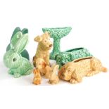 A collection of Sylvac animals, to include Terriers and rabbits, a Bourne Denby green rabbit and a