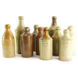 A collection of Lincoln stoneware beer bottles, stamps to include Mortimer, Hatton, Sharpe and