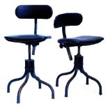 A pair of mid 20thC green painted industrial machinist or engineers chairs or stools, (Tan-sad) each