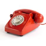 A 1978 vintage red GPO746 telephone.