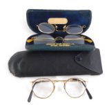 A collection of spectacles and pince nez, to include gold coloured frames. (4)
