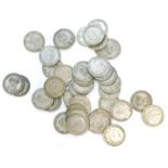 A quantity of mainly George V silver shillings.