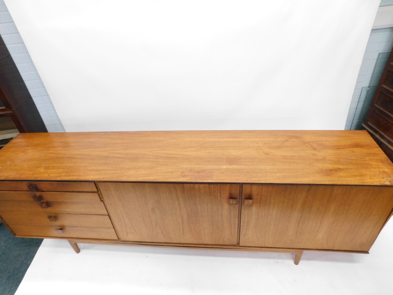 A 1960's teak sideboard, possibly Kefod Larsson for G-plan, with five graduated drawers, and two - Image 2 of 2