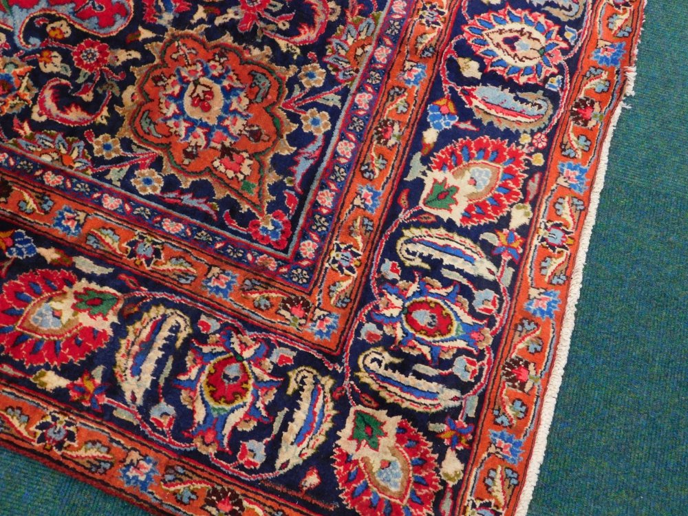 A large Persian Meshed type carpet, with a central medallion, surrounded by an elaborate design to - Image 2 of 3