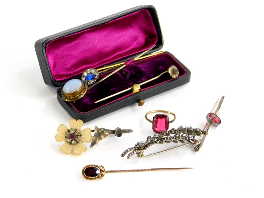 A group of costume jewellery, to include a rolled gold and paste stone dress ring, three bar